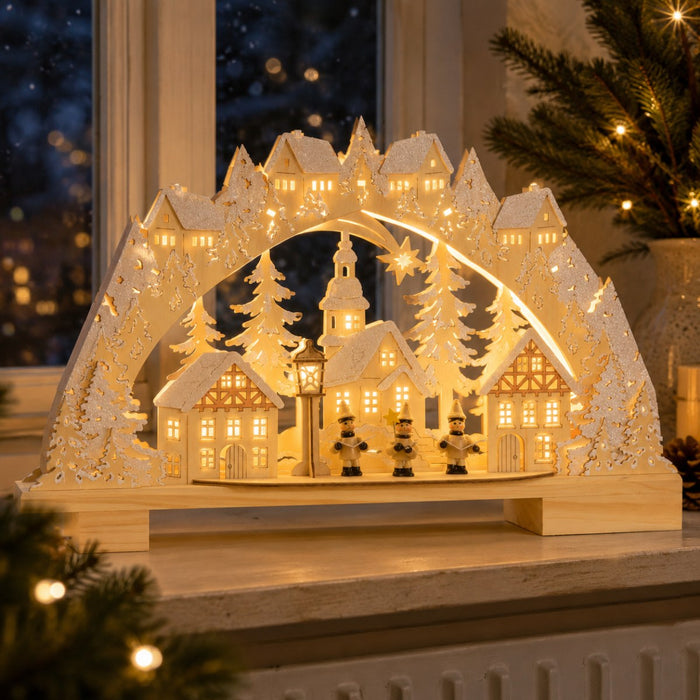 Riffelmacher LED Schwibbogen "Kurrendesänger im Dorf" 45 x 27 cm - 76242 | Natur Weiß
