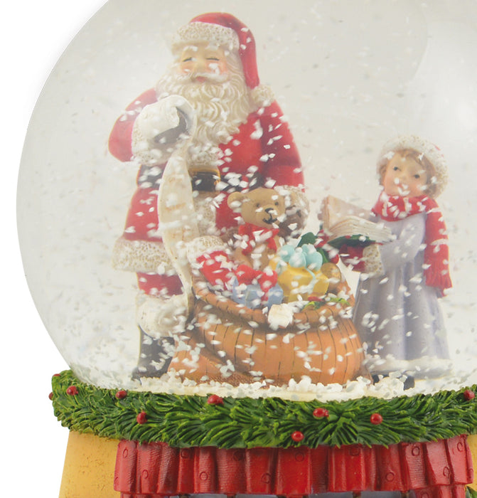 Spieluhr Schneekugel "Weihnachtsmann mit Geschenkesack und Teddy" 14 cm | 72284
